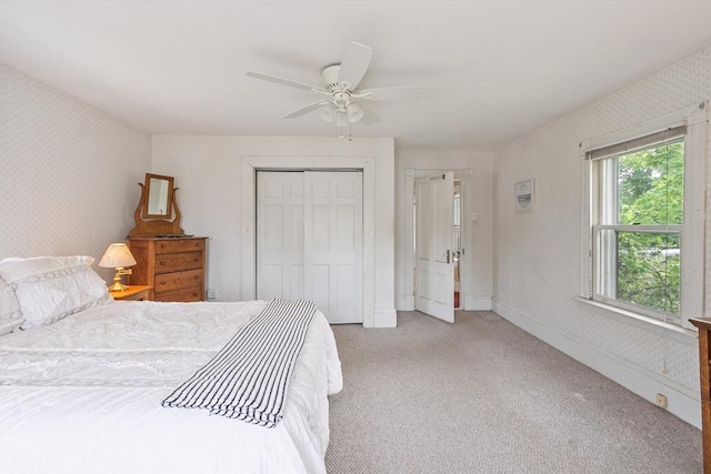 20 Walden St, Lowell, MA 01851 - bedroom with wallpapered walls, light colored carpet, a closet, and a ceiling fan
