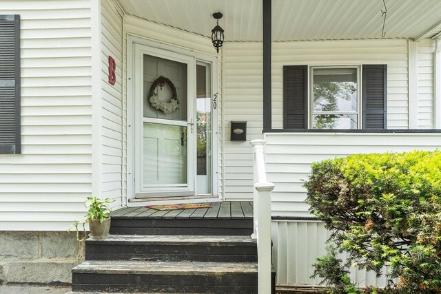 20 Walden St, Lowell, MA 01851 - entrance to property featuring a porch
