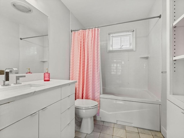 full bathroom featuring tile patterned floors, vanity, toilet, and shower / tub combo