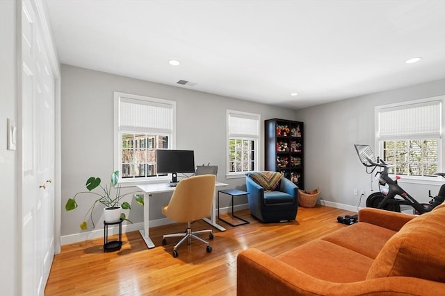 home office featuring recessed lighting, baseboards, light wood finished floors, and visible vents