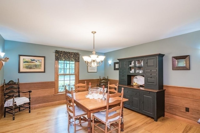 137 French King Hwy, Gill, MA 01354 - dining space featuring a chandelier, wainscoting, and light wood-style floors