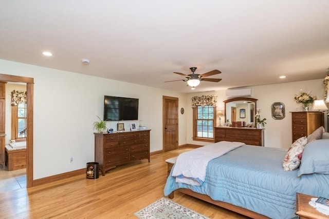 137 French King Hwy, Gill, MA 01354 - bedroom featuring a wall mounted AC, light wood-type flooring, baseboards, recessed lighting, and ceiling fan