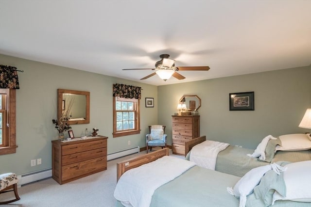 137 French King Hwy, Gill, MA 01354 - carpeted bedroom featuring baseboard heating and a ceiling fan