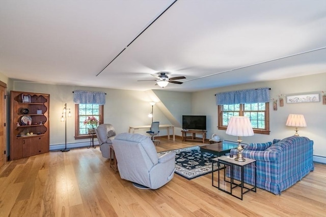 137 French King Hwy, Gill, MA 01354 - living area featuring light wood-type flooring, ceiling fan, and baseboards