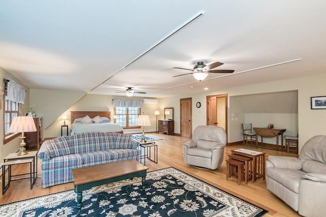 137 French King Hwy, Gill, MA 01354 - living area with ceiling fan, light wood finished floors, and a wall mounted air conditioner