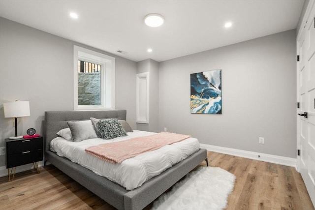 19 Johnson Pl Unit 19, Newton, MA 02466 - bedroom with light wood-type flooring and recessed lighting