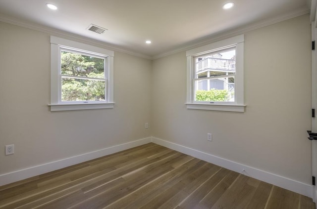 7 Cove Way, Gloucester, MA 01930 - empty room with baseboards, wood finished floors, recessed lighting, and crown molding