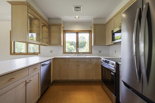 7 Cove Way, Gloucester, MA 01930 - kitchen with appliances with stainless steel finishes, a sink, light brown cabinetry, and recessed lighting