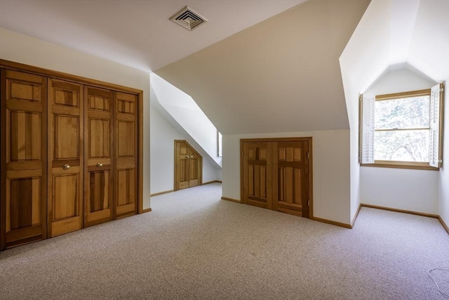 7 Cove Way, Gloucester, MA 01930 - bonus room featuring carpet floors, vaulted ceiling, and baseboards