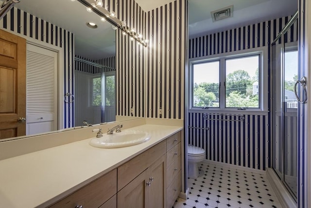7 Cove Way, Gloucester, MA 01930 - bathroom featuring vanity, wallpapered walls, toilet, a shower stall, and baseboards