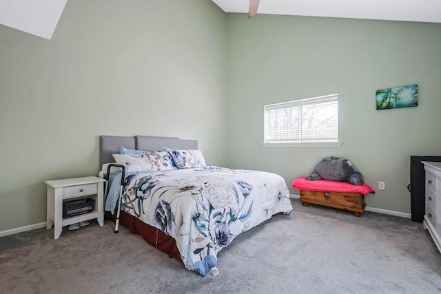 carpeted bedroom featuring baseboards