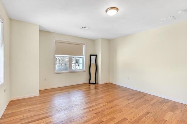 empty room featuring light wood-type flooring