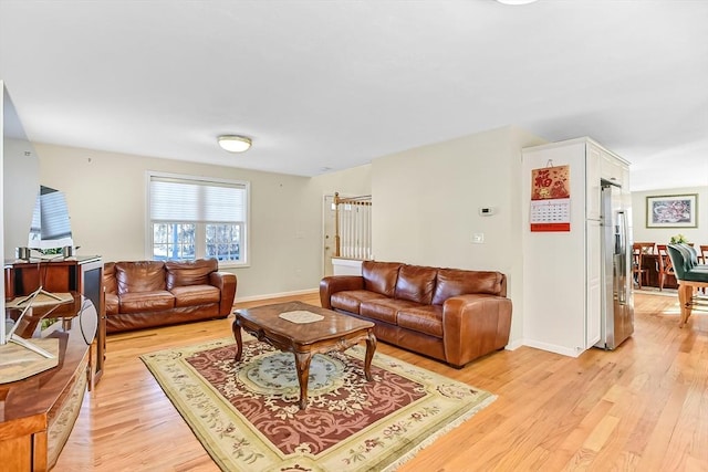 living room featuring light wood-type flooring