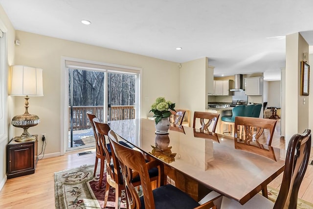 dining room with light wood-type flooring