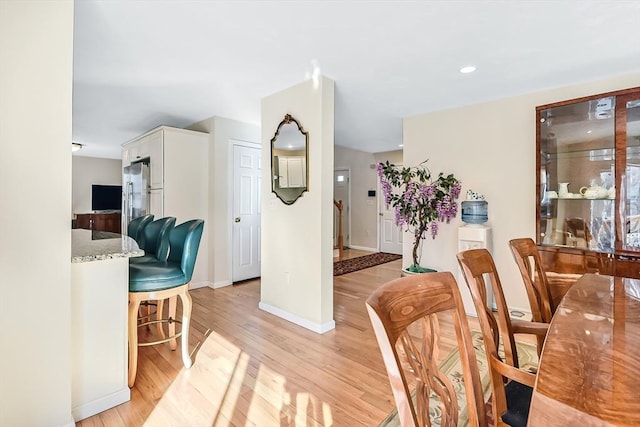 dining area featuring light hardwood / wood-style floors