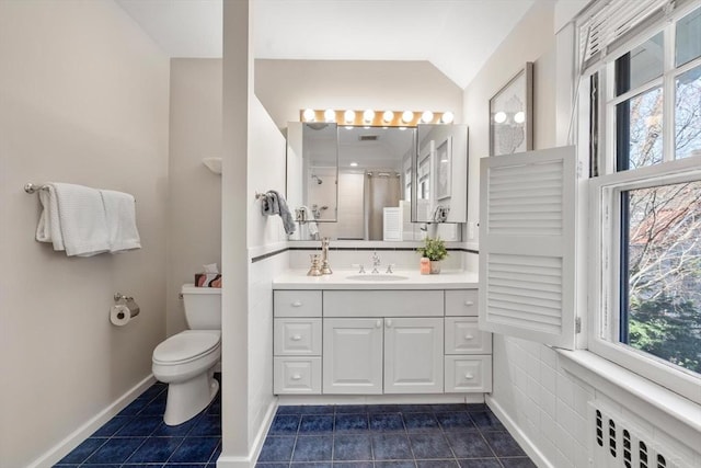 full bathroom with toilet, plenty of natural light, radiator heating unit, and tile patterned flooring