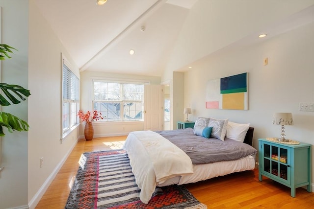 bedroom with light wood-type flooring, vaulted ceiling, baseboards, and recessed lighting