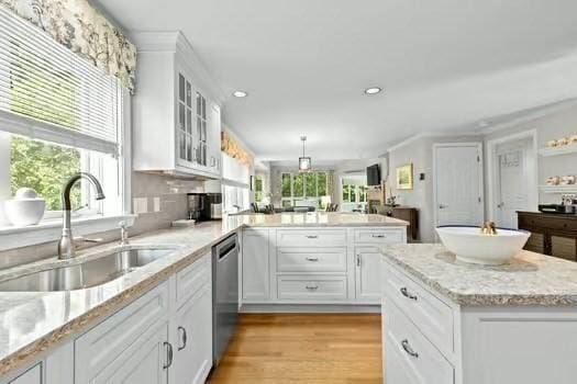 65 Tussock Brook Rd Unit 65, Duxbury, MA 02332 - kitchen featuring a sink, dishwasher, a peninsula, white cabinets, and recessed lighting