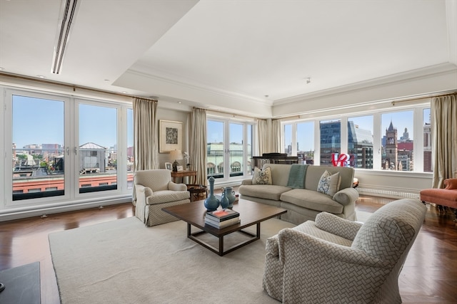 living room with crown molding and parquet flooring