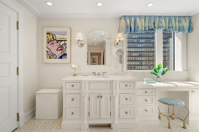 bathroom with recessed lighting and vanity