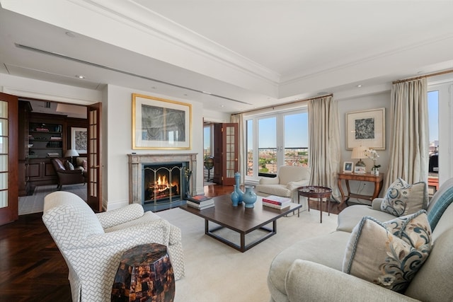 living room with parquet flooring and french doors