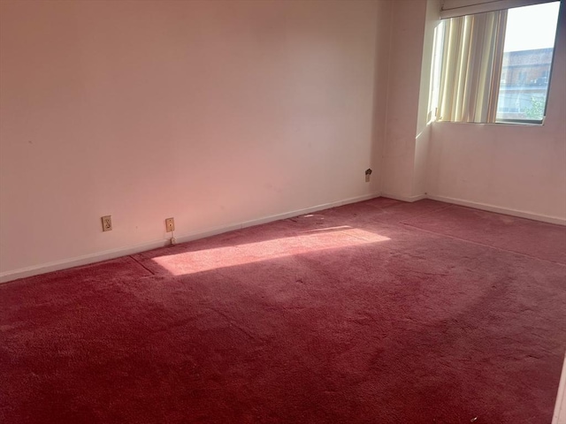 24 Corey St Unit 305, Everett, MA 02149 - unfurnished room featuring carpet floors and baseboards