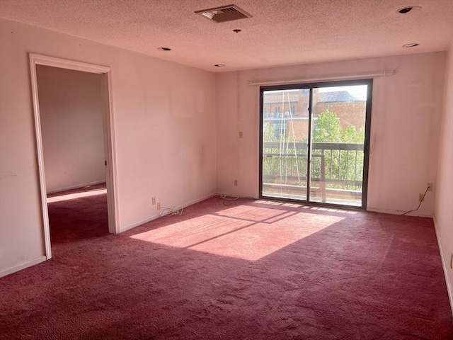 24 Corey St Unit 305, Everett, MA 02149 - empty room with carpet and a textured ceiling