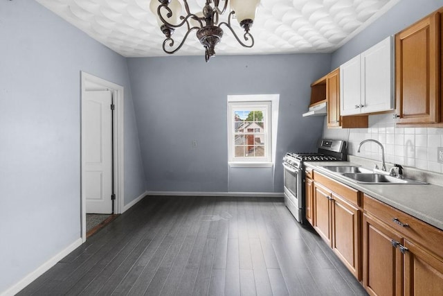 186 John St, Fall River, MA 02721 - kitchen with stainless steel gas range, a sink, a chandelier, light countertops, and open shelves