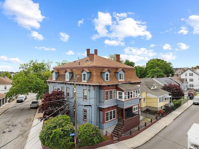 186 John St, Fall River, MA 02721 - rear view of property featuring a chimney