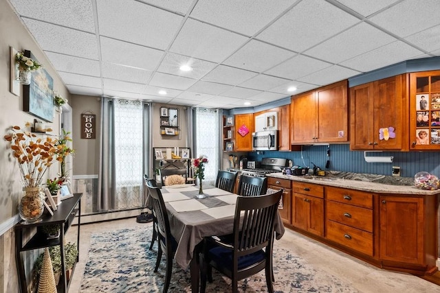 186 John St, Fall River, MA 02721 - dining room with a paneled ceiling, a baseboard heating unit, and recessed lighting
