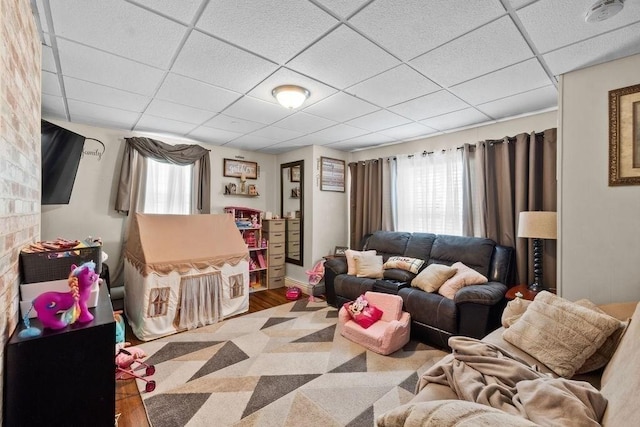186 John St, Fall River, MA 02721 - living area with a paneled ceiling and wood finished floors
