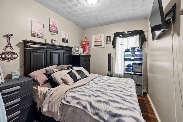 186 John St, Fall River, MA 02721 - bedroom with dark wood-style floors and baseboards