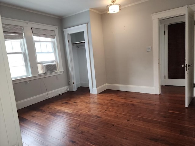 235 Common St, Watertown, MA 02472 - unfurnished bedroom featuring cooling unit, wood-type flooring, ornamental molding, a closet, and baseboards