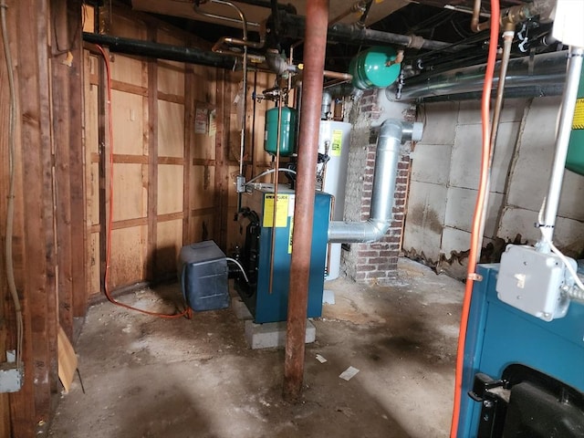 235 Common St, Watertown, MA 02472 - unfinished below grade area with a heating unit
