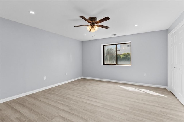 404 Broadway Unit 107, Lynn, MA 01904 - unfurnished bedroom featuring light wood-style floors, a closet, recessed lighting, and a ceiling fan