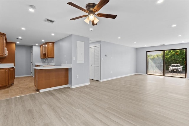 404 Broadway Unit 107, Lynn, MA 01904 - unfurnished living room featuring a ceiling fan, light wood-style flooring, and recessed lighting