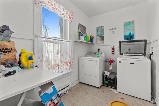 clothes washing area with independent washer and dryer