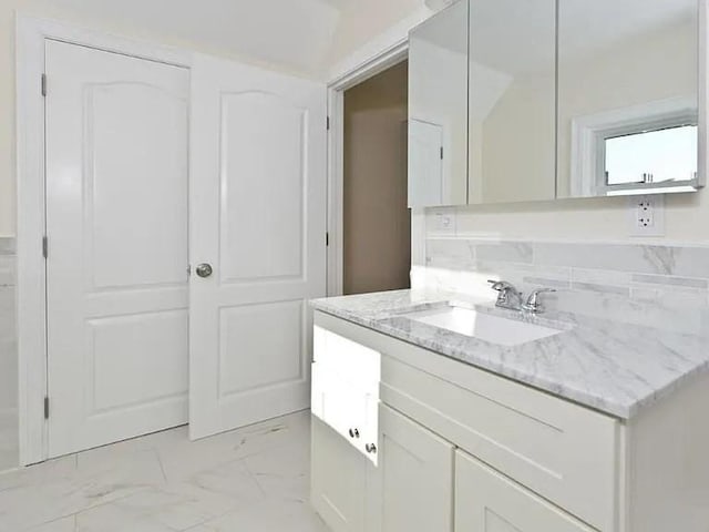 15 Phillips St, Weymouth, MA 02188 - bathroom featuring marble finish flooring and vanity