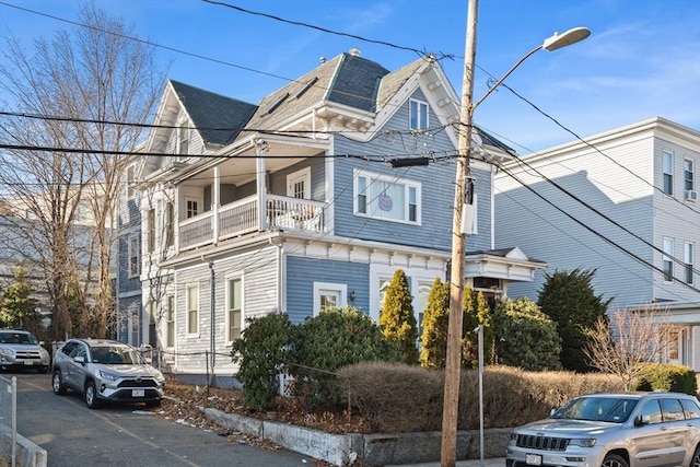 view of property exterior featuring a balcony