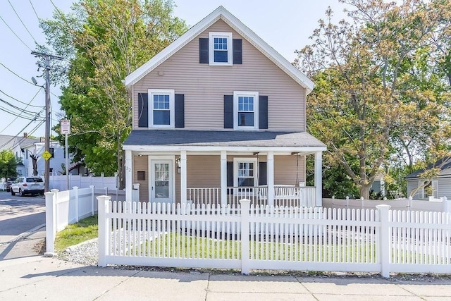 32 Jewett St, Boston, MA 02131 - view of front of property with a porch and a fenced front yard