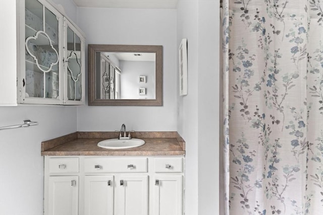 55 Williams St Unit 501, Taunton, MA 02780 - bathroom featuring vanity and a shower with curtain