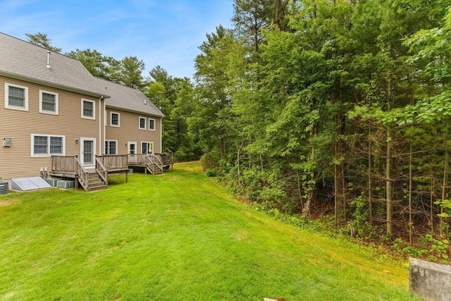 55 Williams St Unit 501, Taunton, MA 02780 - view of grassy yard featuring a deck