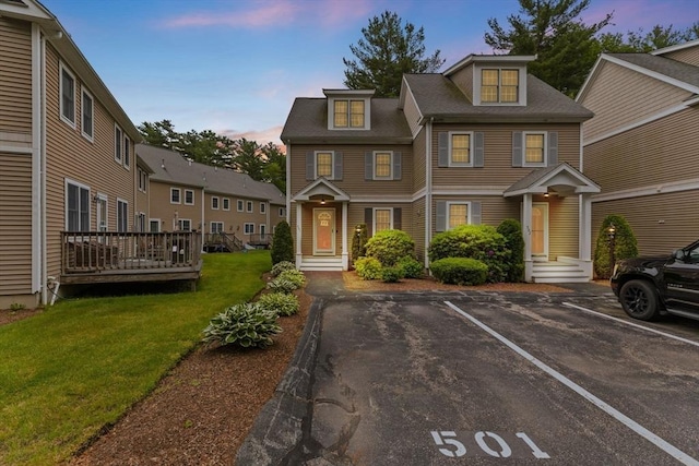 55 Williams St Unit 501, Taunton, MA 02780 - view of property featuring uncovered parking and a lawn