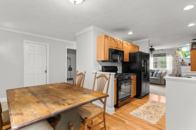 55 Williams St Unit 501, Taunton, MA 02780 - kitchen featuring black appliances, recessed lighting, light wood-style floors, and crown molding