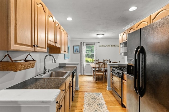 55 Williams St Unit 501, Taunton, MA 02780 - kitchen with black appliances, ornamental molding, light wood-style flooring, recessed lighting, and dark countertops