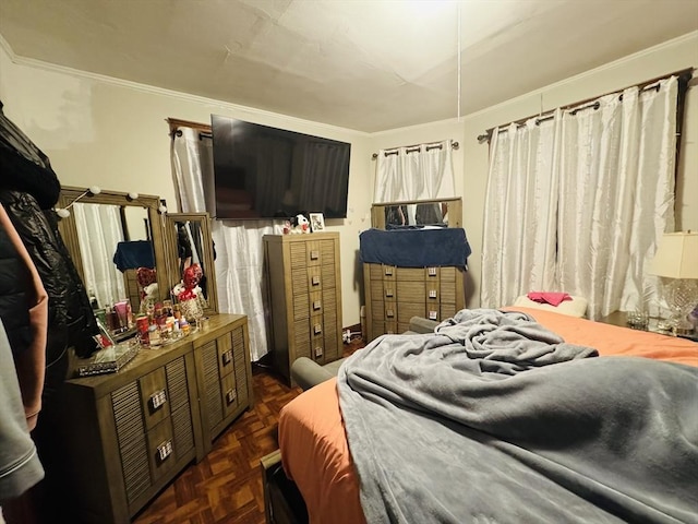 bedroom with ornamental molding