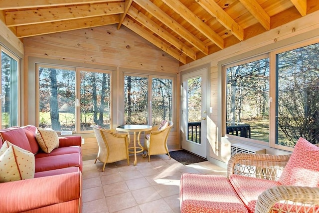 sunroom featuring vaulted ceiling with beams and wooden ceiling