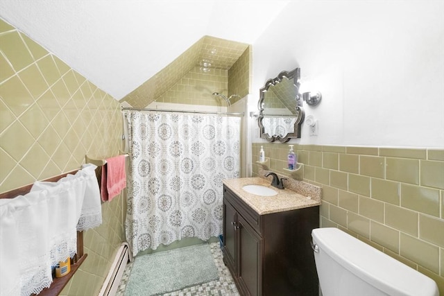 bathroom featuring a shower with shower curtain, vanity, baseboard heating, and tile walls