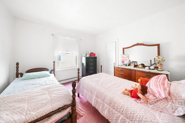 bedroom with a baseboard heating unit