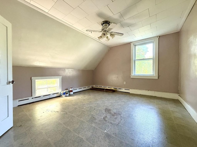 527 Collins Corner Rd, Dartmouth, MA 02747 - additional living space featuring ceiling fan, vaulted ceiling, tile patterned floors, and baseboards